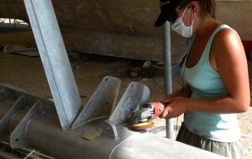 Amanda happily tuned out while polishing the forebeam