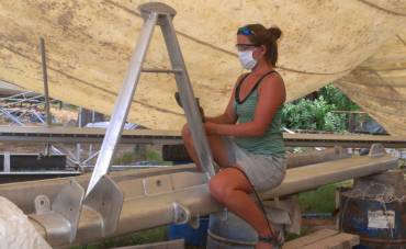 Amanda polishing the forebeam A-frame