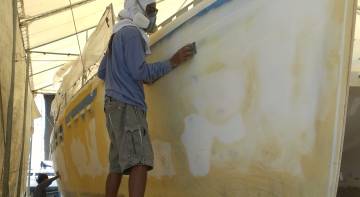 Jack & Lek started using long-boards to sand the topsides