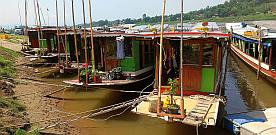 Long-boats lined up on the Mekong