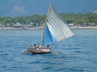 The pretty local fishing boats are very active