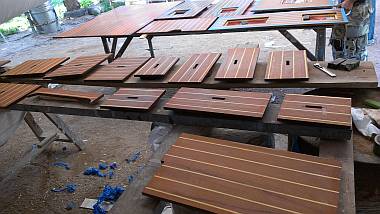 Our many floorboards, bottoms epoxied & ready for polyurethane