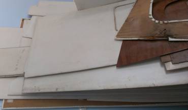 Some of our 50+ pieces of headliner. Some need new plywood