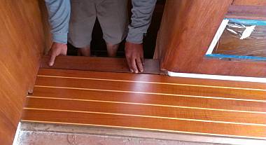 The top of the starboard step needs a small strip of teak added