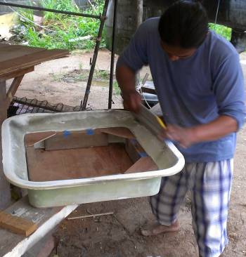 Houa shaping the interior trim for the new forward hatches