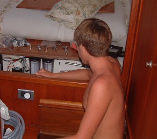 Watermaker installed under a bunk, with the membrane in the bilge