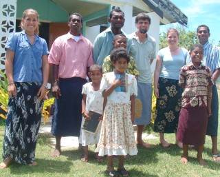 Fijians and Ocelot crew outside the church at Sese village, Yasawas