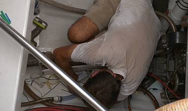 A sweaty Jon, replacing the portside engine room float switch