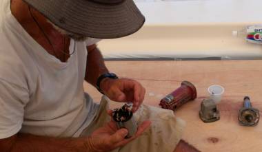 Jon reassembling our powerful grinder, holding the new stator