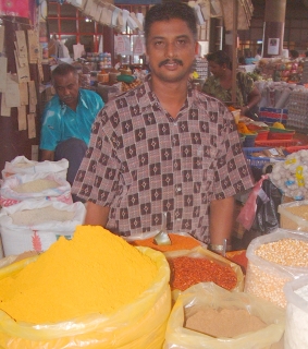 An Indo-Fijian tends his spice stall at the Lautoka Market