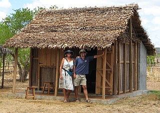 Mom & Dad outside our rustic thatch bungalow