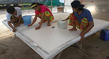 Our Indonesians got the bimini sanded up to 2000